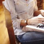 young-woman-at-home-working-on-laptop-476850553-57a13c545f9b589aa922804e