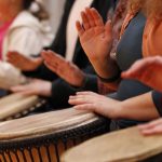 cropped-lady-playing-djembe1